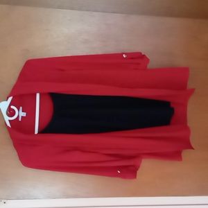 Notations one piece top. Perfect for dress up or casual wear.